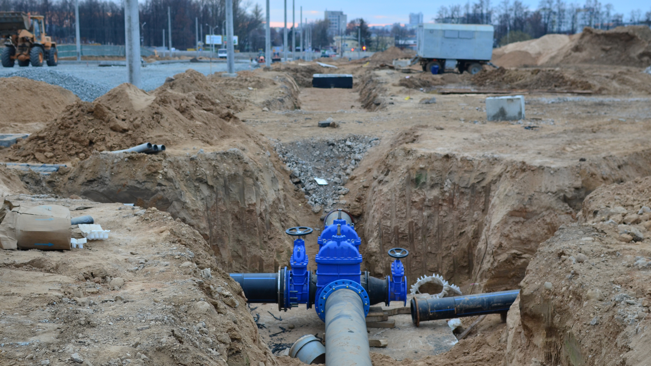 Drain Bros llc handles sewer or septic repairs, showing equipment at work before the new system is fully installed.