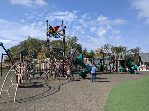 Families enjoy a playground near homes after Drain Bros llc finished safe and careful residential excavation work nearby.