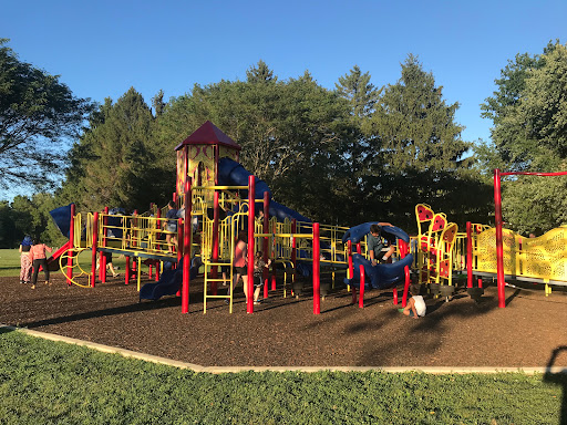 Kids enjoy the playground, unaware of hidden sewer issues nearby that Drain Bros llc can fix quickly and safely.