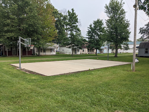 Drain Bros llc made this basketball court area better for play after working on the yard in a neighborhood setting.